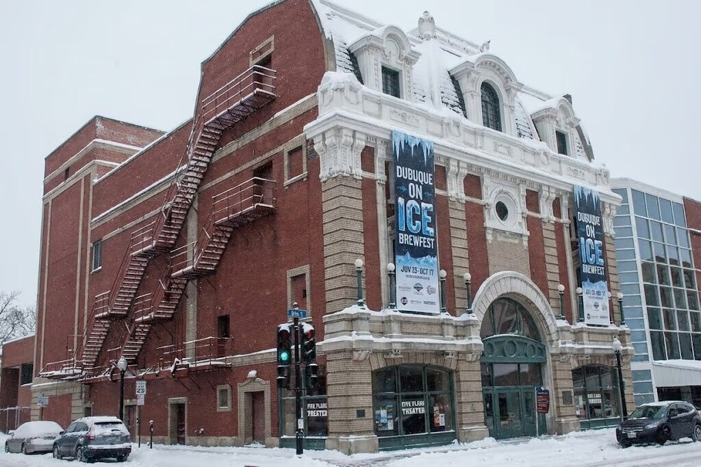 Downtown Dubuque Main Street winter scene near Five Flags Center with historic architecture and festive atmosphere for beer festival weekend